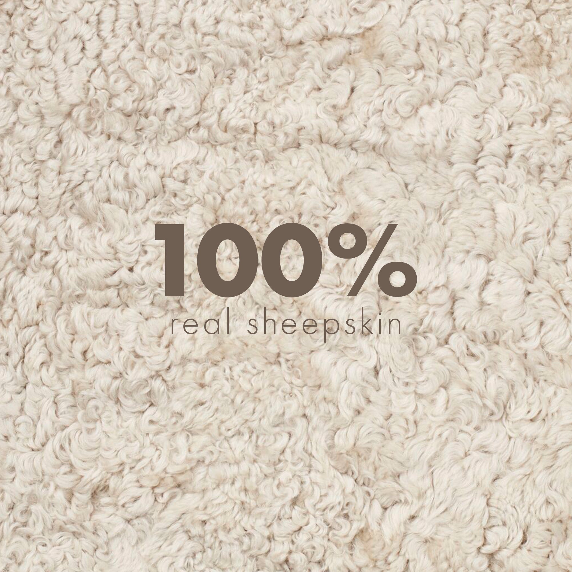 Close-up of 100% real curly sheepskin wool - Pearl